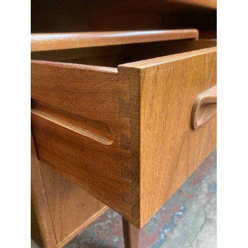 105 - A mid 20th century G Plan Fresco teak dressing table - approx. 122cm high x 145cm wide x 46cm deep