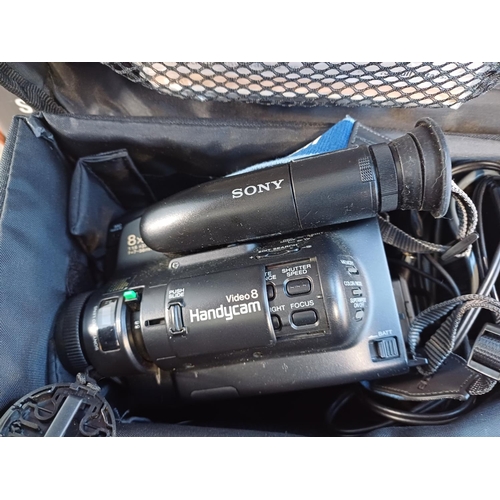 336 - A collection of cased camcorders to include Sony, Sharp, Canon, Panasonic etc.