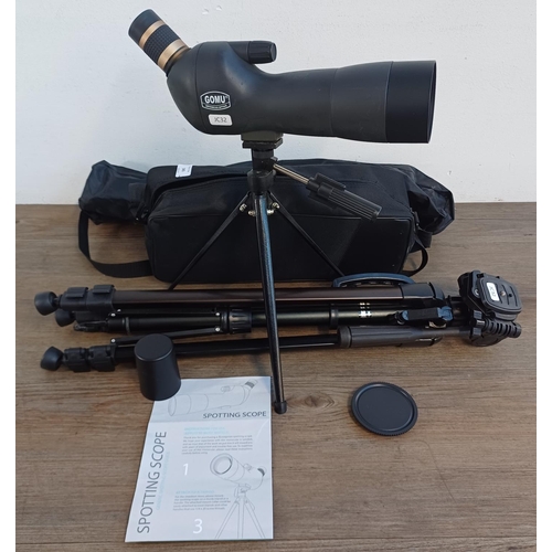 343 - Two cased items, one Ecooproo Gomu spotting scope with tripod and one height adjustable tripod