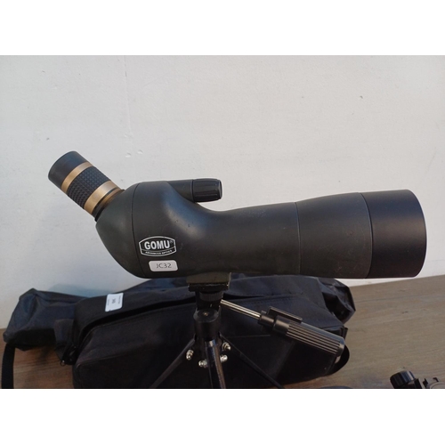 343 - Two cased items, one Ecooproo Gomu spotting scope with tripod and one height adjustable tripod