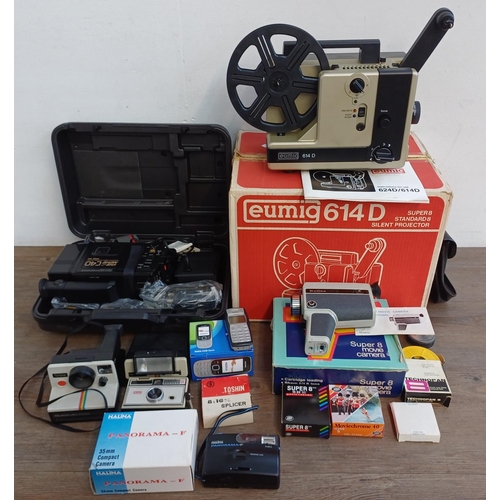 345 - A collection of items to include boxed Eumig 614D Super8/Standard8 cine projector, boxed Halina Supe... 