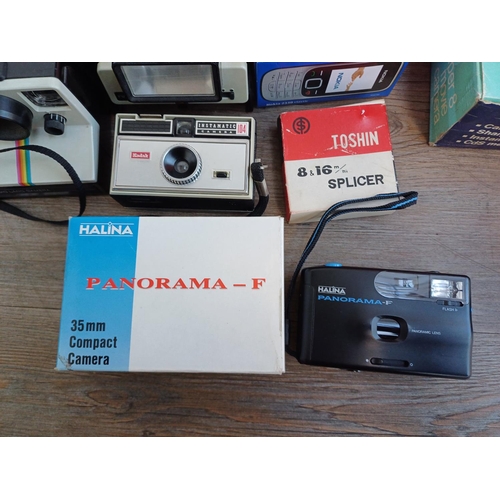 345 - A collection of items to include boxed Eumig 614D Super8/Standard8 cine projector, boxed Halina Supe... 