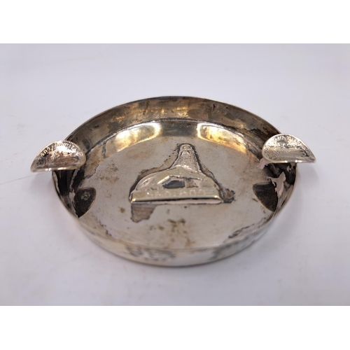 2432 - A 20th century B.A Sevadjian Ethiopian silver ashtray with embossed lion decoration - approx. gross ... 