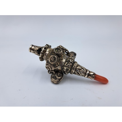 2443 - A late 19th/early 20th century sterling silver and coral baby rattle - approx. gross weight 16g