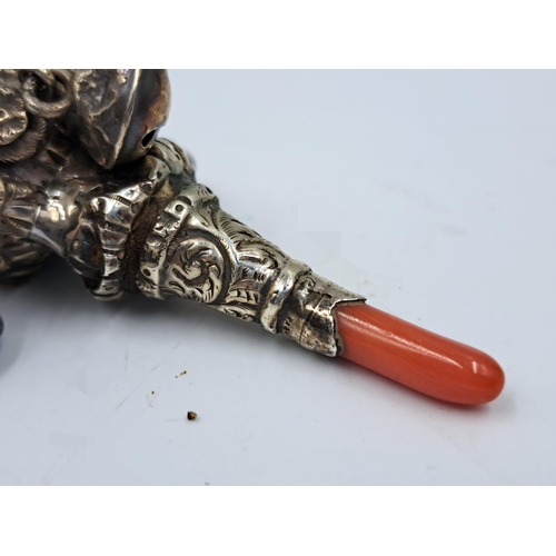 2443 - A late 19th/early 20th century sterling silver and coral baby rattle - approx. gross weight 16g