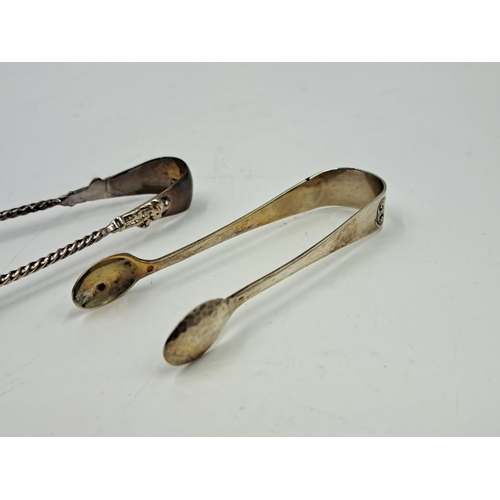 2450 - Two pairs of hallmarked Birmingham silver sugar tongs, one Liberty & Co. Ltd. and one Thomas Hayes -... 