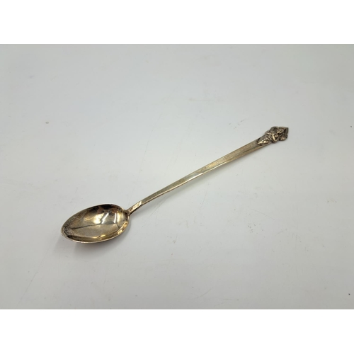 2451 - A sterling silver spoon spoon with embossed buddha design, stamped S. AM to reverse - approx. gross ... 