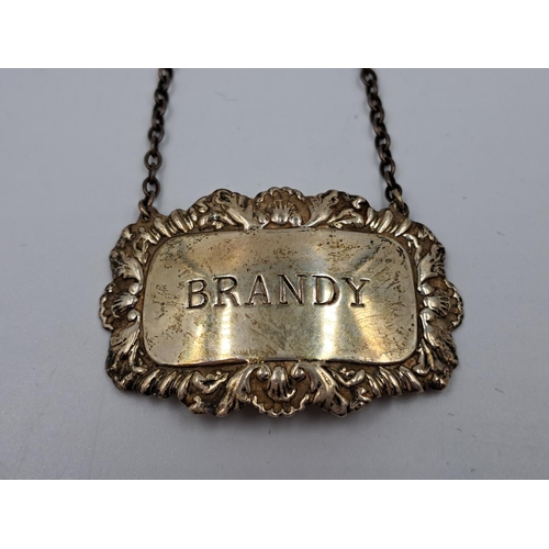 2460 - A hallmarked Birmingham silver brandy decanter label - approx. gross weight 14.26g