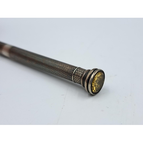 2461 - A Sampson Mordan & Co's. hallmarked sterling silver propelling pencil with inset citrine top - appro... 