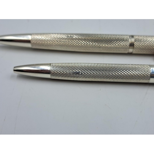 2467 - Two William Manton Ltd. hallmarked Birmingham silver pens, dated 1969 - approx. gross weight 34g