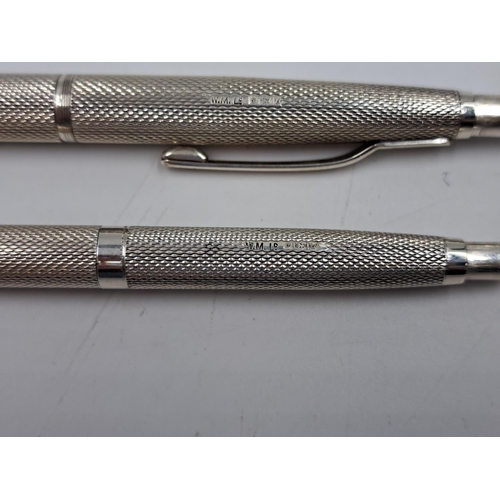 2467 - Two William Manton Ltd. hallmarked Birmingham silver pens, dated 1969 - approx. gross weight 34g