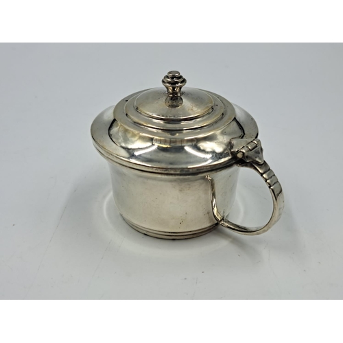 2498 - A Lanson Ltd. hallmarked Birmingham silver condiment pot with spoon and blue glass insert - approx. ... 