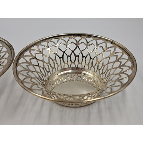 2501 - A pair of George V Charles S Green & Co. Ltd. hallmarked Birmingham pierced silver bon bon dishes, d... 