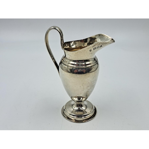 2502 - An Edwardian Edward Barnard & Sons Ltd. hallmarked London silver creamer on pedestal base, dated 190... 