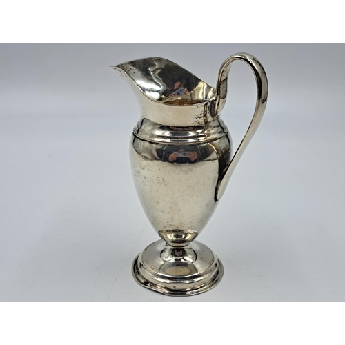 2502 - An Edwardian Edward Barnard & Sons Ltd. hallmarked London silver creamer on pedestal base, dated 190... 