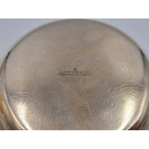 2505 - Two items, one Garrard & Co. Ltd. hallmarked London silver dish with central coat of arms - approx. ... 