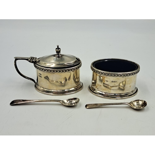 2514 - Two Docker & Burn Ltd. hallmarked Birmingham silver condiment pots with spoons and glass inserts, da... 