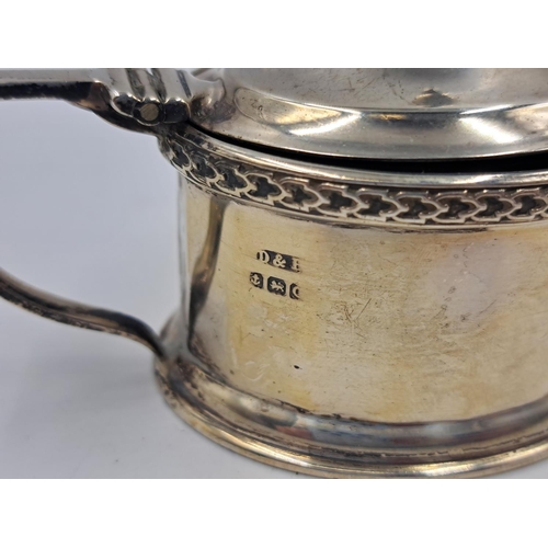 2514 - Two Docker & Burn Ltd. hallmarked Birmingham silver condiment pots with spoons and glass inserts, da... 