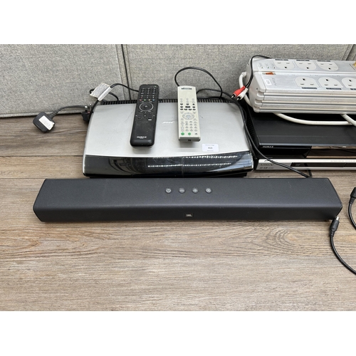 413 - A collection of AV items to include JBL soundbar, Bose AV28 media centre, Sony DVP-NS30 DVD player w... 