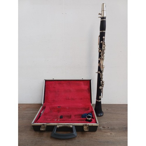 375 - A cased wooden Boosey & Hawkes Edgware clarinet - made in England