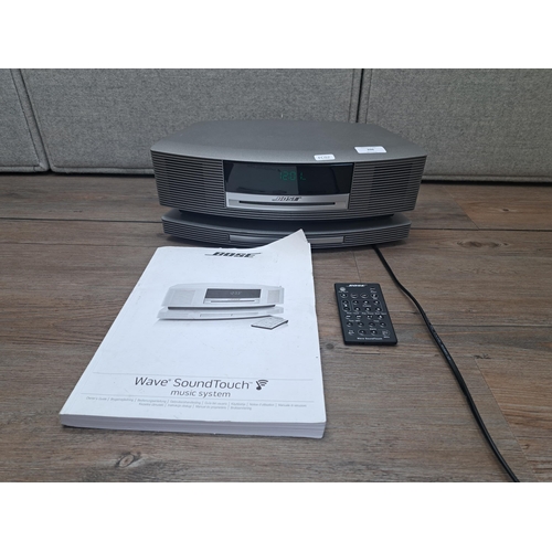 396 - A Bose Wave III SoundTouch music system with remote control and instruction manual