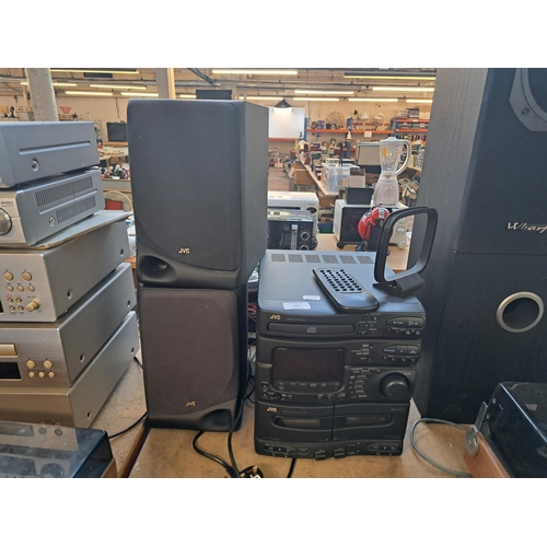 399 - A JVC MX-S30 compact stereo system comprising CD player, Dolby twin cassette deck, four-band receive... 