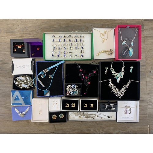 932 - A collection of boxed costume jewellery to include Life Charms bracelet, Heathergems pin brooch etc.