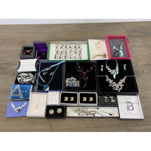 932 - A collection of boxed costume jewellery to include Life Charms bracelet, Heathergems pin brooch etc.