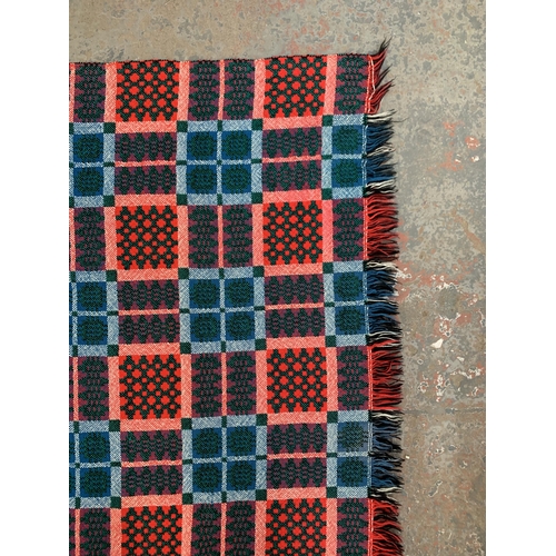 950 - A mid 20th century double sided Welsh blanket - approx. 220cm x 170cm