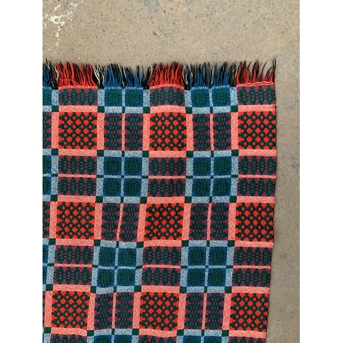 950 - A mid 20th century double sided Welsh blanket - approx. 220cm x 170cm