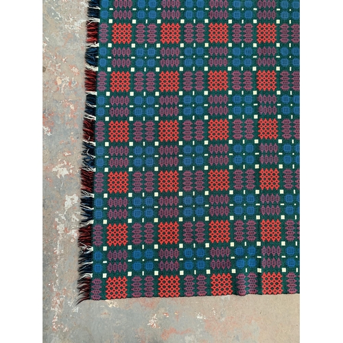 950 - A mid 20th century double sided Welsh blanket - approx. 220cm x 170cm