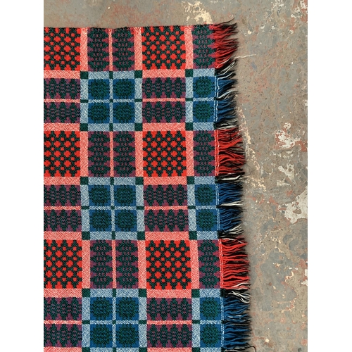 950 - A mid 20th century double sided Welsh blanket - approx. 220cm x 170cm