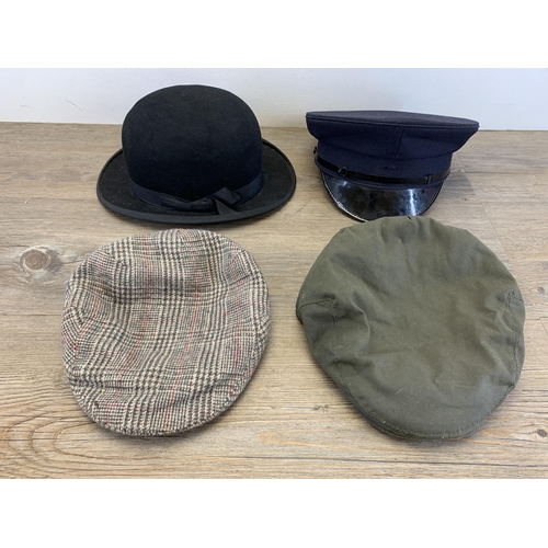 966 - Four vintage men's hats to include rabbit hair felt bowler etc.