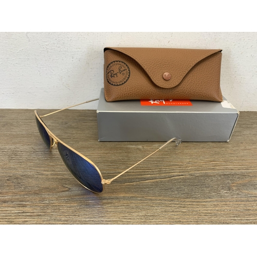 968 - A pair of boxed and cased Ray-Ban Aviator prescription sunglasses