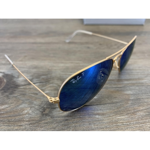 968 - A pair of boxed and cased Ray-Ban Aviator prescription sunglasses