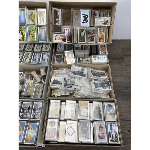 989 - A large collection of cigarette, tea and collectors cards