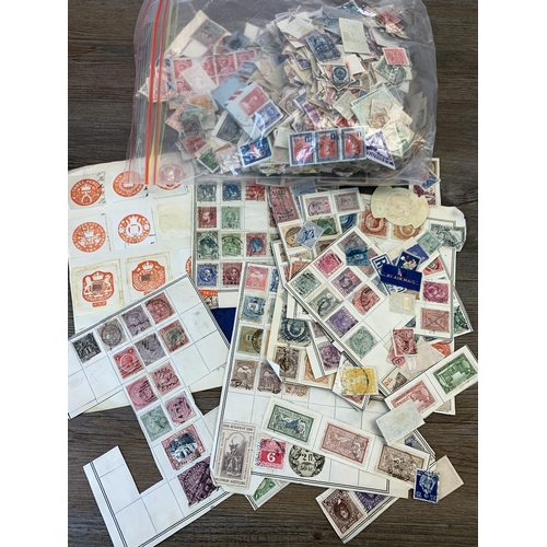 990 - Five albums containing a collection of antique and later worldwide stamps