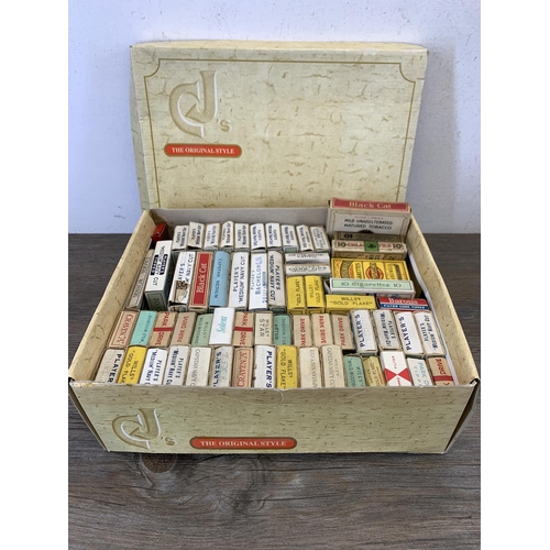 991 - A collection of vintage cigarette packets to include Black Cat, Player's Navy Cut, Park Drive etc.