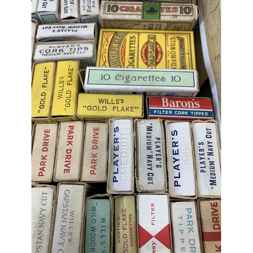 991 - A collection of vintage cigarette packets to include Black Cat, Player's Navy Cut, Park Drive etc.