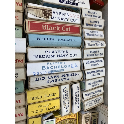 991 - A collection of vintage cigarette packets to include Black Cat, Player's Navy Cut, Park Drive etc.