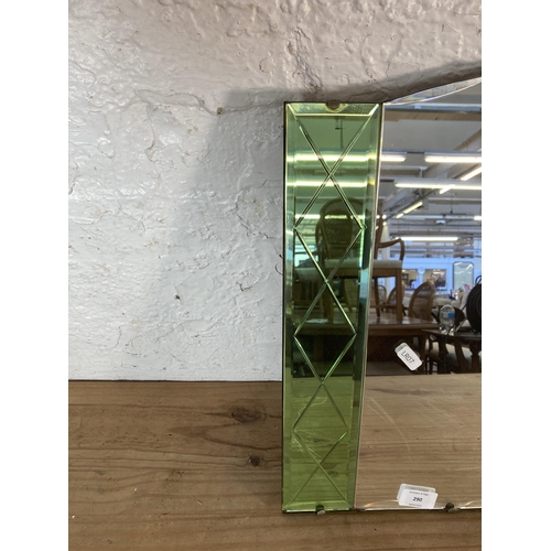 290 - An Art Deco style frameless bevelled edge wall hanging mirror with green tinted glass - approx. 46cm... 