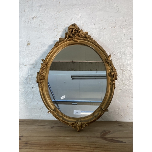 292 - A 19th century style gilt framed oval wall mirror - approx. 66cm high x 46cm wide