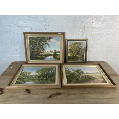 300 - Four framed F.D. Oliver landscape scene oil paintings - largest approx. 47cm high x 57cm wide