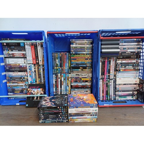 367 - Three boxes containing a large collection of DVDs to include eight Harry Potter, Coco, the Sting, So... 