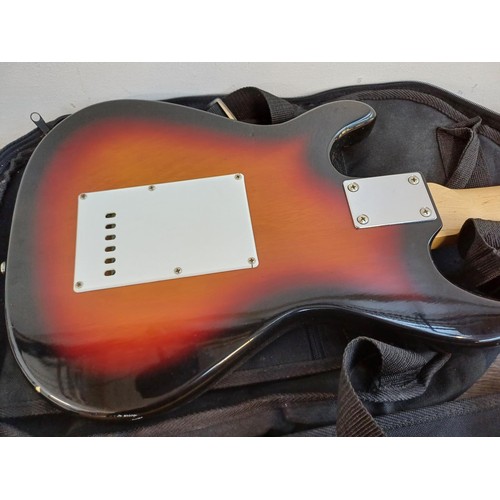 370 - Two cased double cutaway electric guitars, one Elevation child's and one sunburst two-pickup