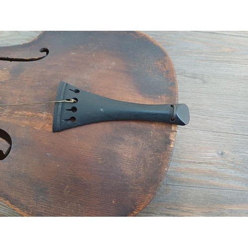 376 - Two unlabelled violins, one possibly baroque with tuning pegs and tailpiece (at fault - break at hee... 