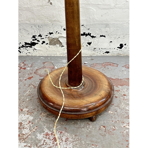 144A - A 1930s stained beech standard lamp - approx. 190cm high including shade