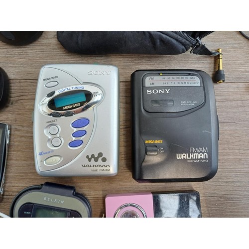 378 - A collection of items to include Sony WM-FX277 and WM-FX113 Walkman personal radio/cassette players,... 