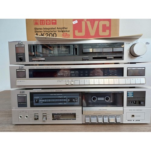 381 - Three items of boxed mid 1980s JVC hi-fi, one A-K200 integrated amplifier with instruction manual, o... 