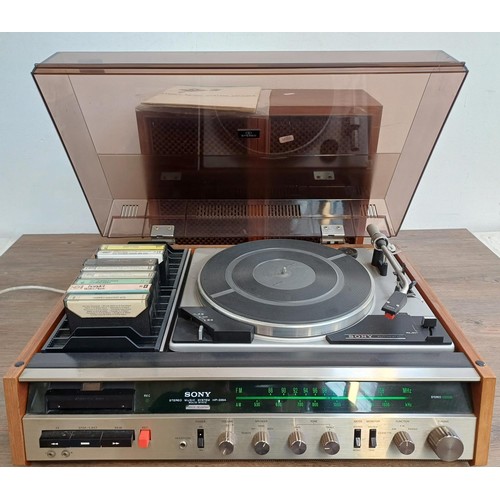 384 - A Sony HP-239A solid state stereo music system comprising two-speed turntable, cassette recorder, tw... 